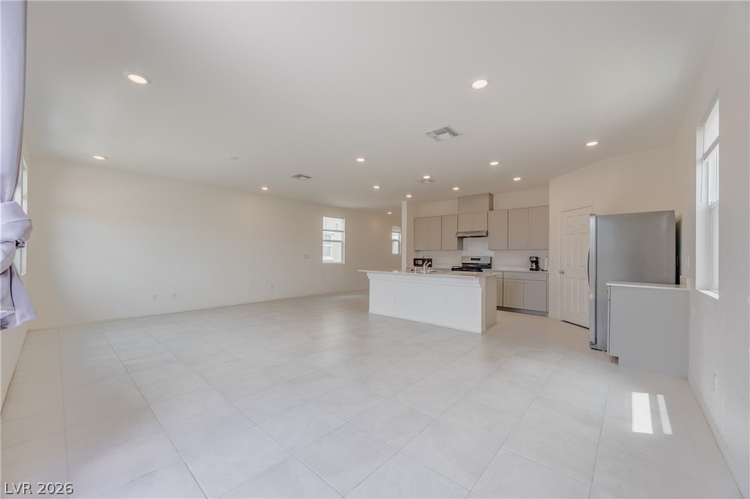 5927 Coja Street Las Vegas, NV 89113 - Photo 11 of 32 Unfurnished living room with recessed lighting