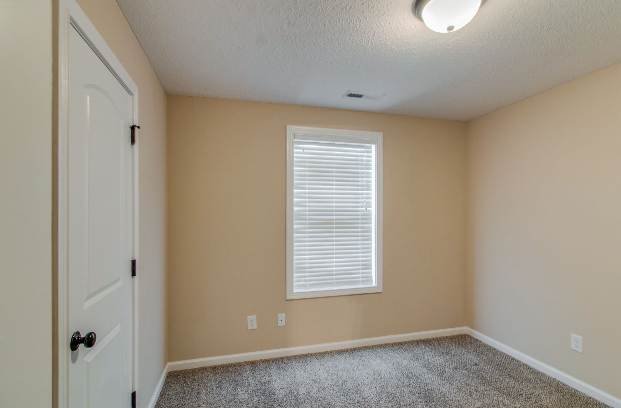 3744 Suiter Road Clarksville, TN 37040 - Photo 20 of 26 a view of an empty room with a window