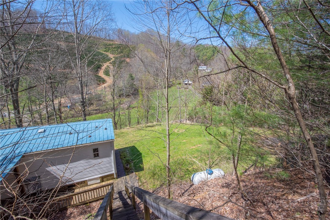 1848 West Mill Creek Road Warrensville, NC 28693 - Photo 48 of 50 a view of a back yard from a patio