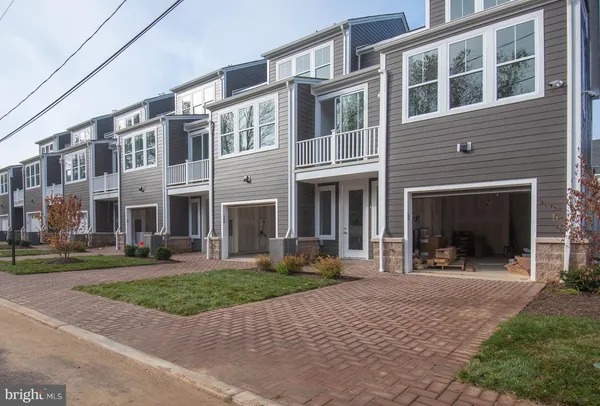a view of a building with a yard