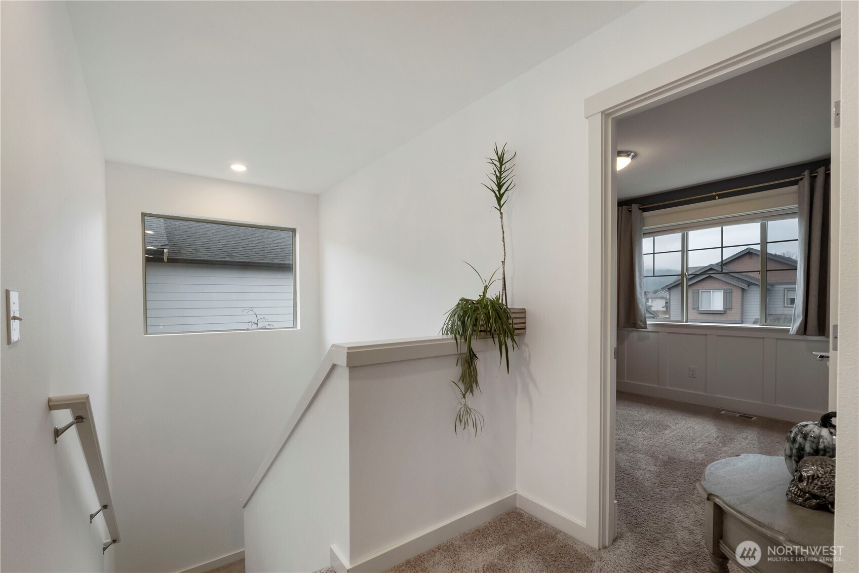 329 South Spruce Street Buckley, WA 98321 - Photo 17 of 36 a living room with furniture and a potted plant