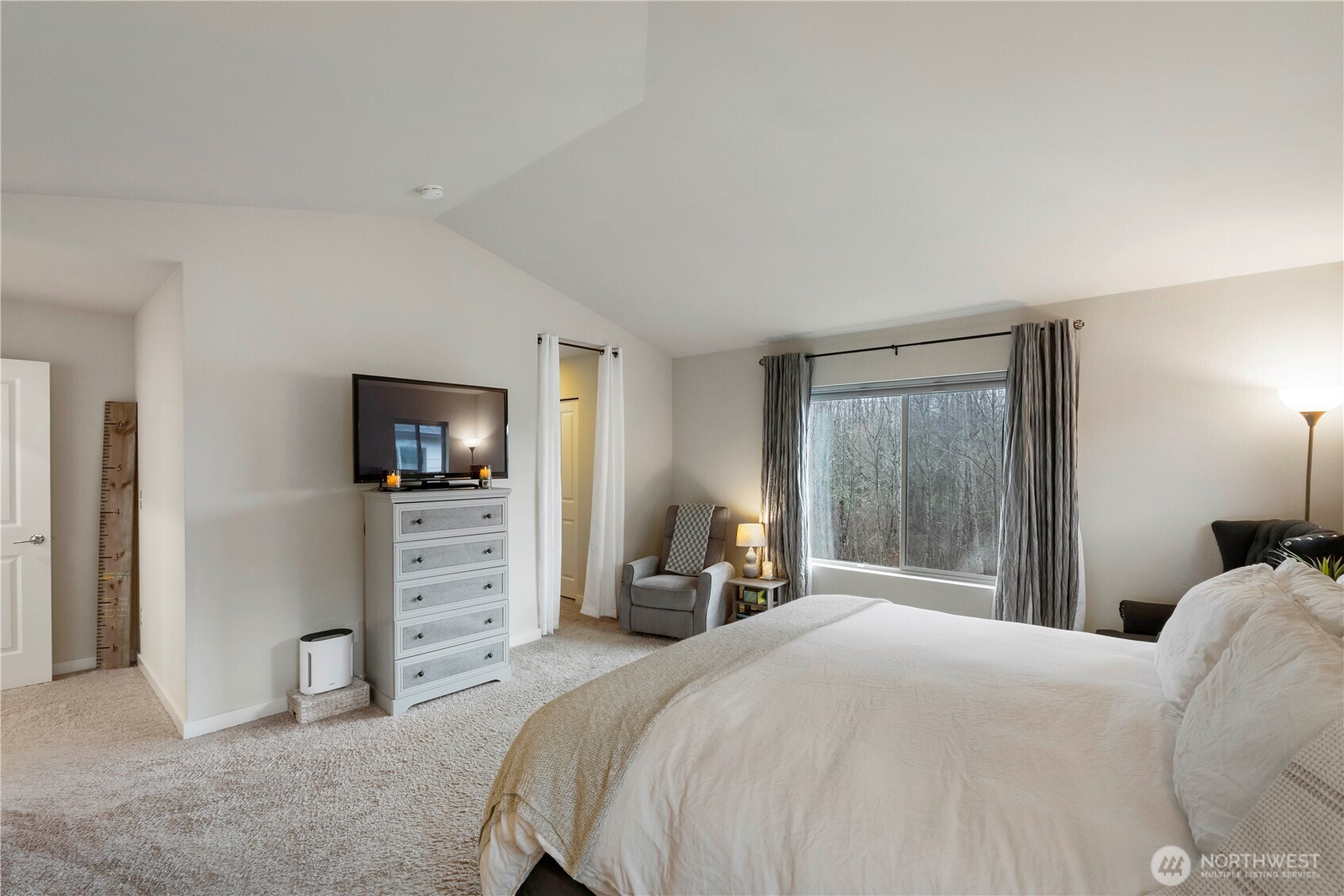 329 South Spruce Street Buckley, WA 98321 - Photo 19 of 36 a bedroom with a bed and a television