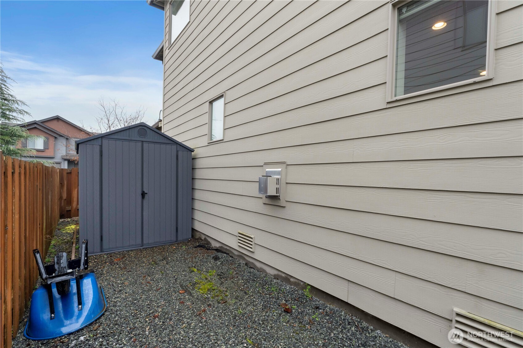 329 South Spruce Street Buckley, WA 98321 - Photo 33 of 36 a view of a house with a backyard