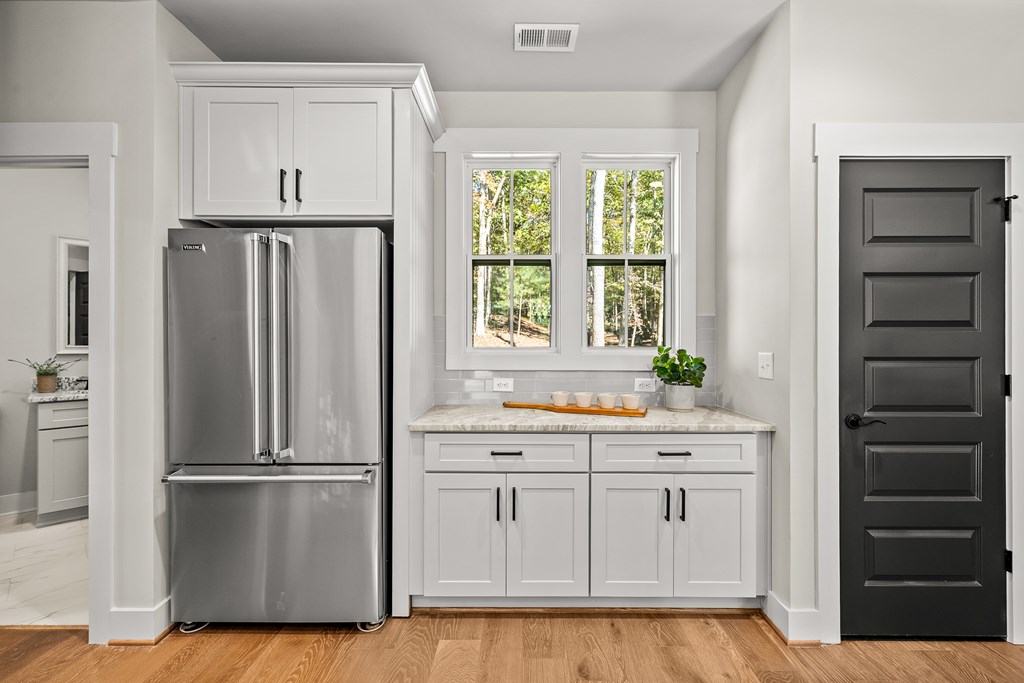 158 Treeline Lane Ellijay, GA 30540 - Photo 14 of 95 a kitchen with a refrigerator and window