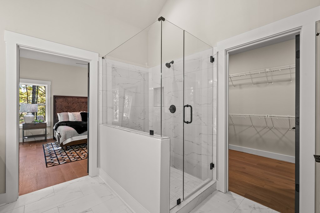 158 Treeline Lane Ellijay, GA 30540 - Photo 22 of 95 a bathroom with a shower and a mirror