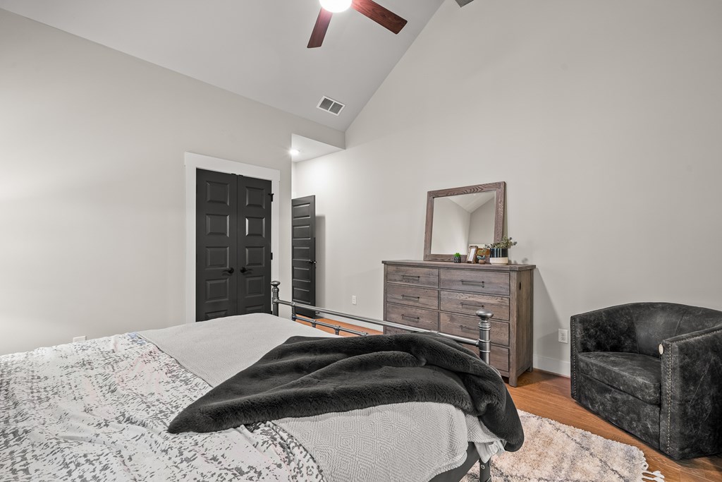 158 Treeline Lane Ellijay, GA 30540 - Photo 25 of 95 a bedroom with a bed and a television