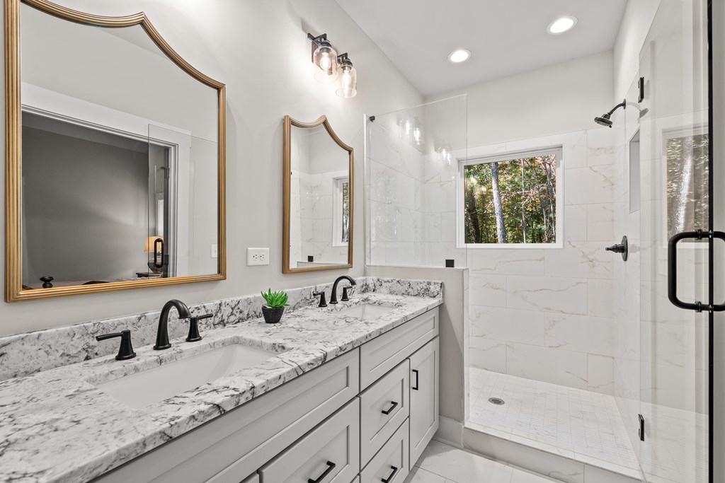 158 Treeline Lane Ellijay, GA 30540 - Photo 40 of 95 a bathroom with a granite countertop sink mirror and double