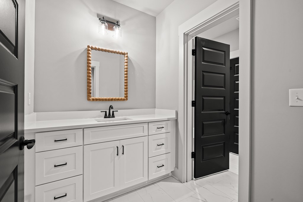 158 Treeline Lane Ellijay, GA 30540 - Photo 45 of 95 a bathroom with a sink and a mirror