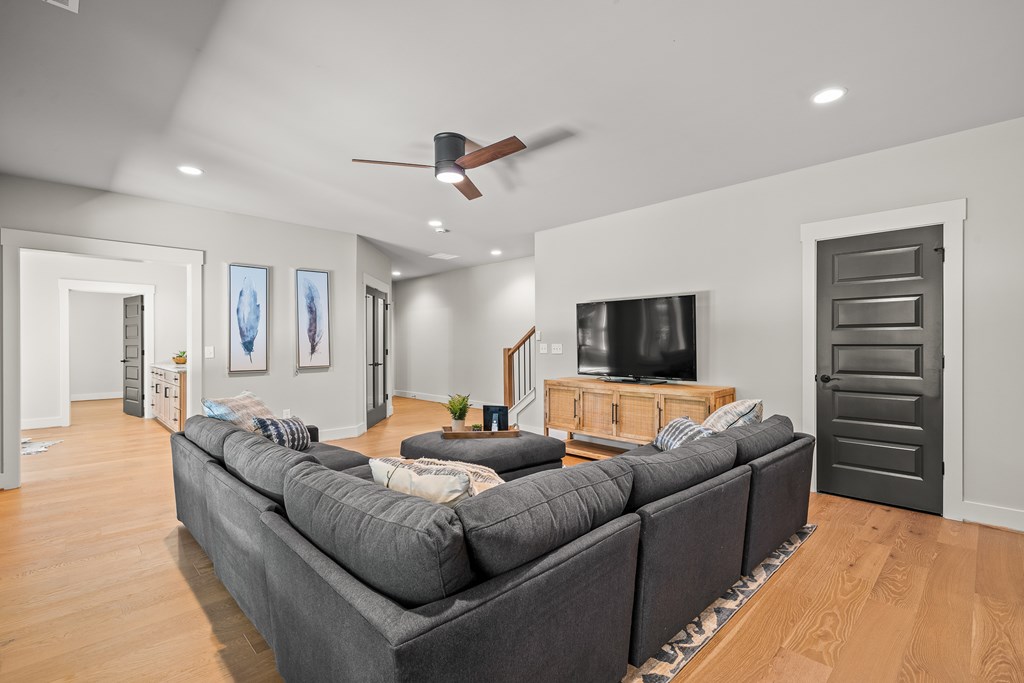 158 Treeline Lane Ellijay, GA 30540 - Photo 48 of 95 a living room with furniture and a flat screen tv