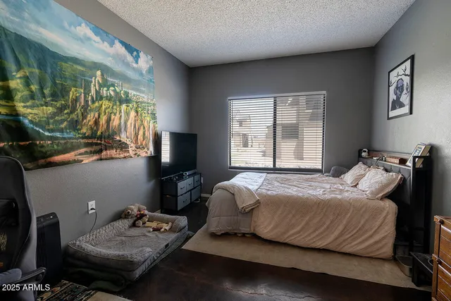 a bathroom with a sink vanity granite and toilet