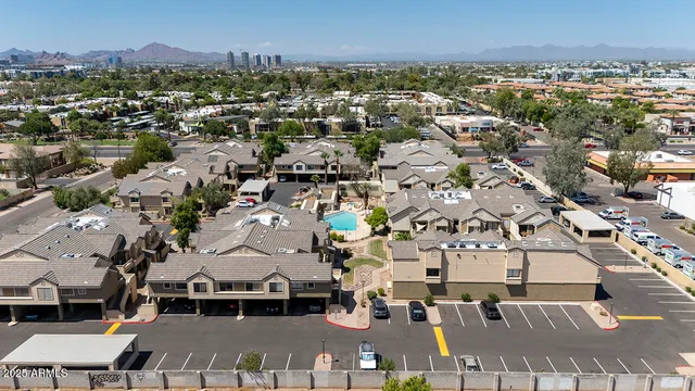 an aerial view of a house with outdoor space