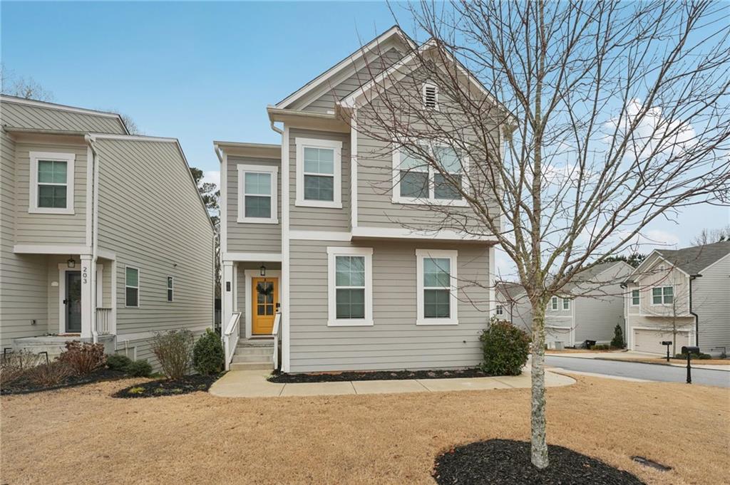95 Denver Avenue Hiram, GA 30141 - Photo 1 of 62 a front view of a house with a yard