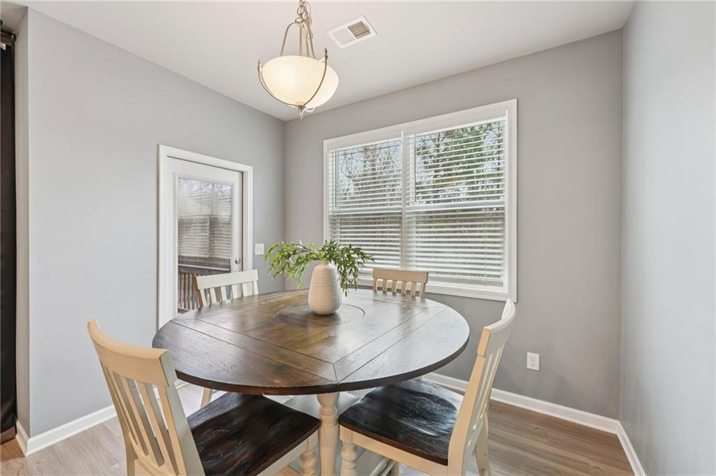 95 Denver Avenue Hiram, GA 30141 - Photo 16 of 62 a view of a dining room with furniture and window