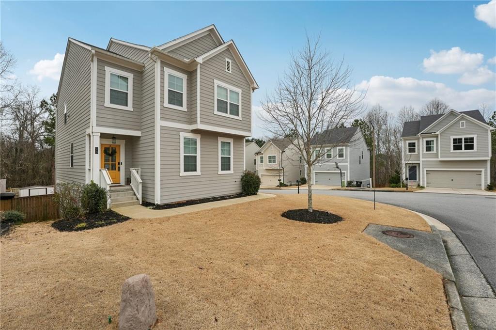 95 Denver Avenue Hiram, GA 30141 - Photo 2 of 62 a house with yard in front of it