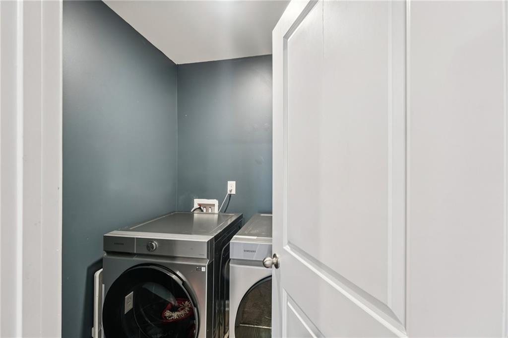 95 Denver Avenue Hiram, GA 30141 - Photo 34 of 62 a utility room with dryer and washer