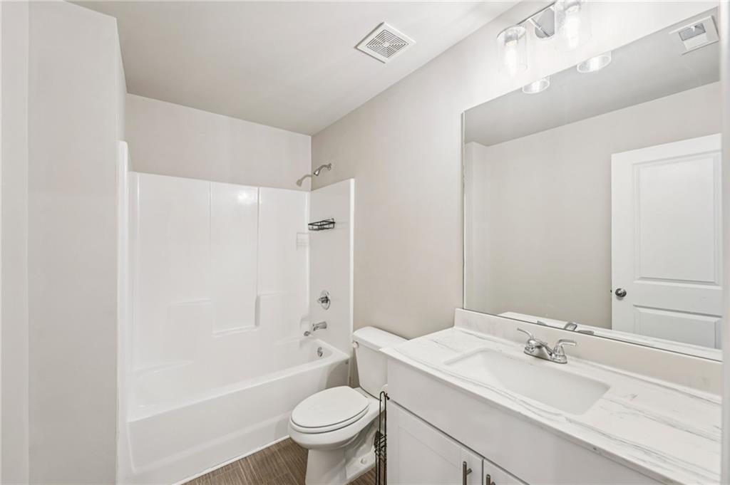 95 Denver Avenue Hiram, GA 30141 - Photo 38 of 62 a bathroom with a sink toilet and shower