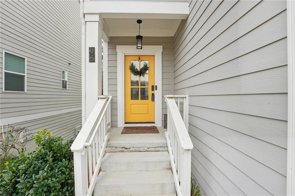 95 Denver Avenue Hiram, GA 30141 - Photo 5 of 62 a front view of a house with a white door