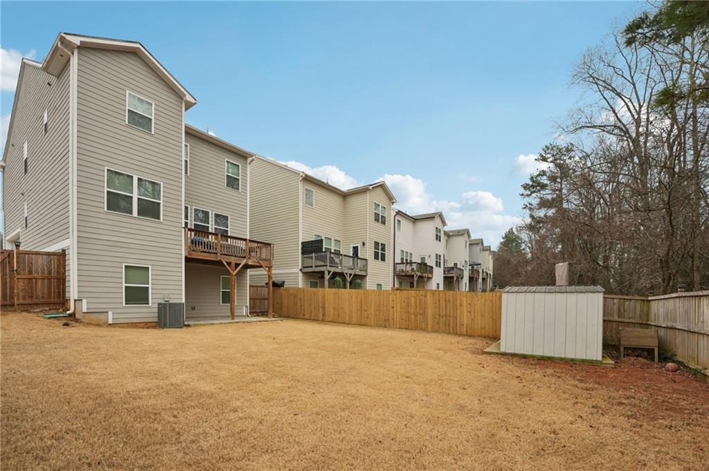 95 Denver Avenue Hiram, GA 30141 - Photo 56 of 62 a view of a house with a wooden fence