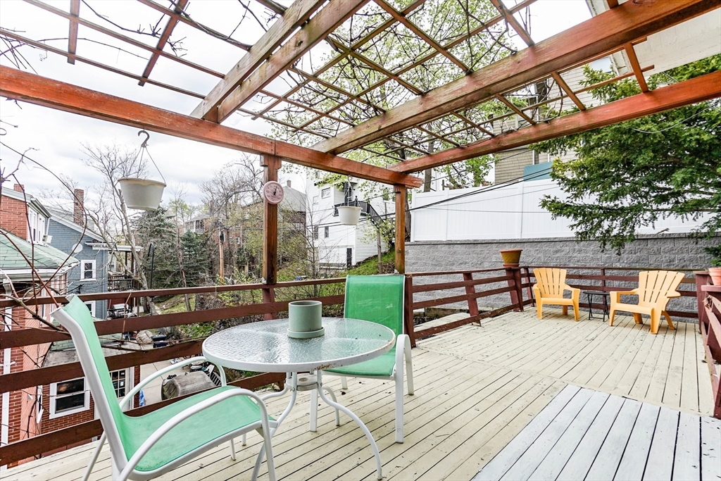 51 Wallingford Road Boston, MA 02135 - Photo 15 of 42 a outdoor view with a sitting space