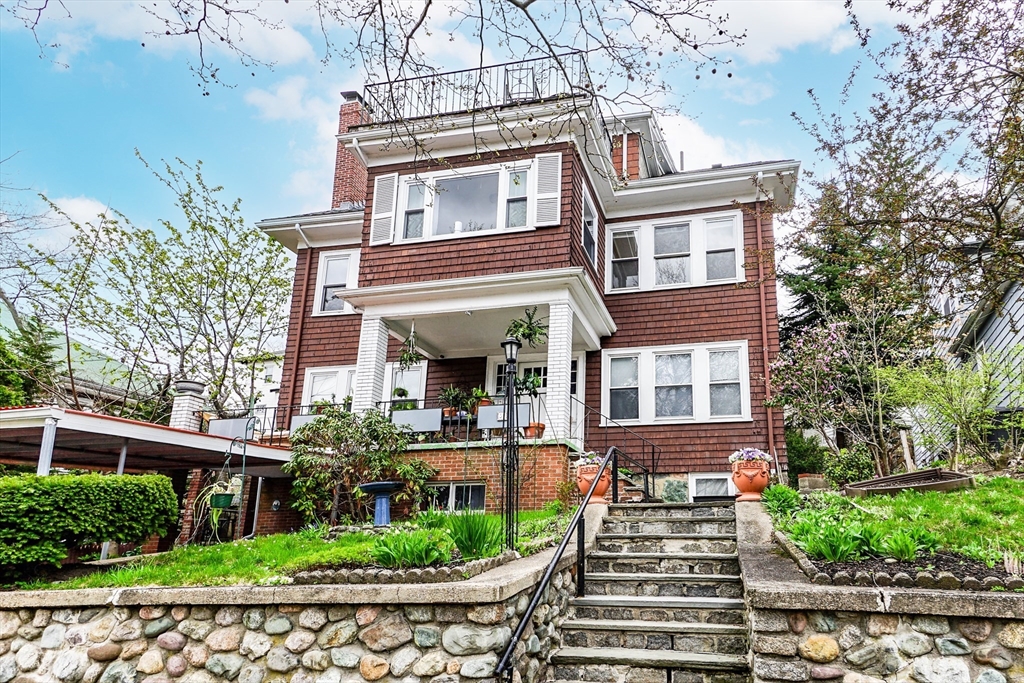 51 Wallingford Road Boston, MA 02135 - Photo 2 of 42 front view of a house with a yard