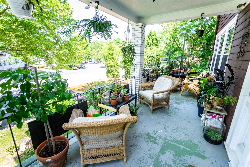51 Wallingford Road Boston, MA 02135 - Photo 34 of 42 a outdoor living space with furniture and a potted plant