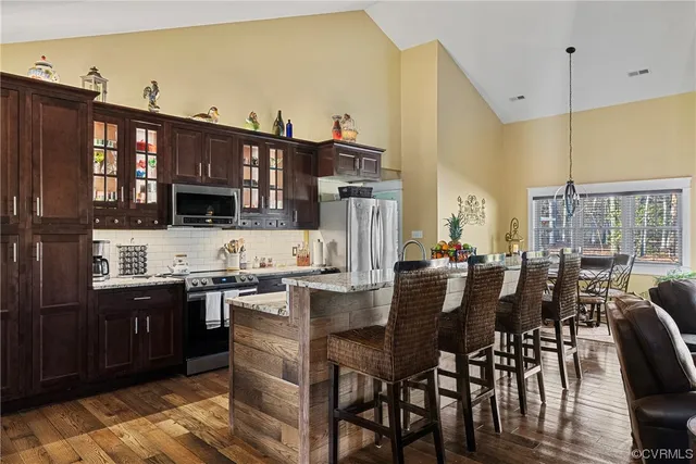 a view of a kitchen and dining room