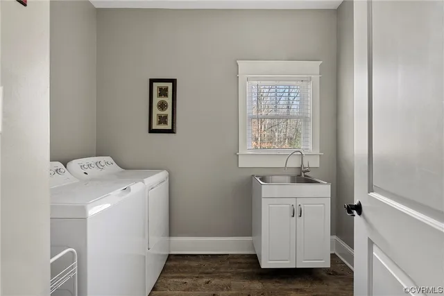 a utility room with a window dryer and washer