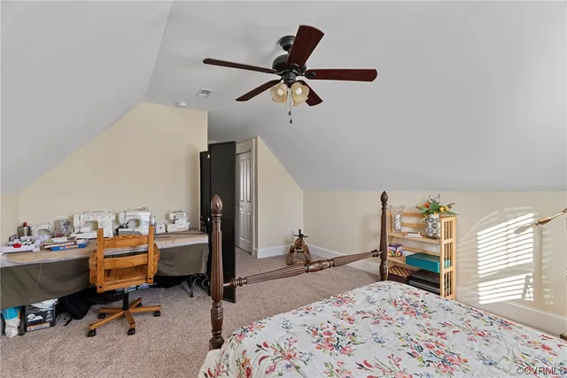 a bed room with a bed and a window