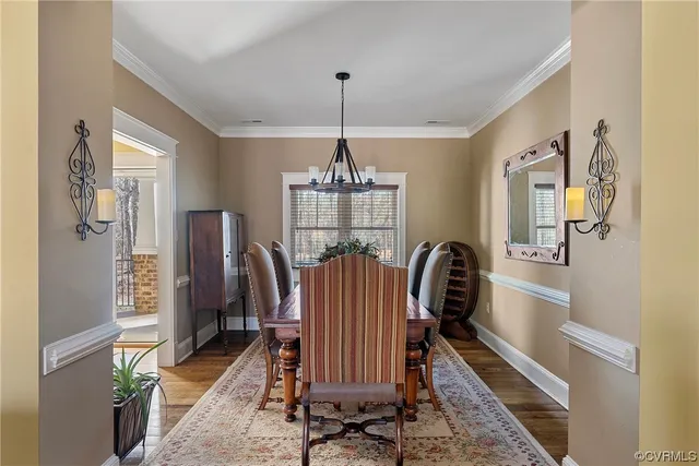 a view of kitchen with furniture and a refrigerator