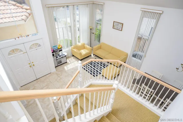 a view of a balcony with wooden floor