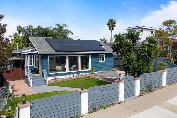 a view of house with outdoor seating space