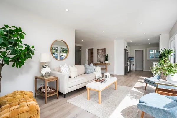 a kitchen with stainless steel appliances granite countertop a sink and cabinets