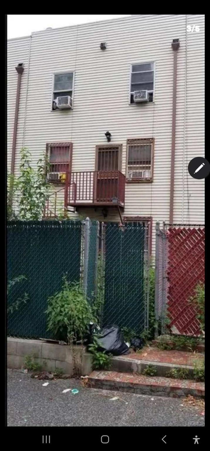 1680 Monroe Avenue Bronx, NY 10457 - Photo 2 of 3 a view of a brick building with many windows