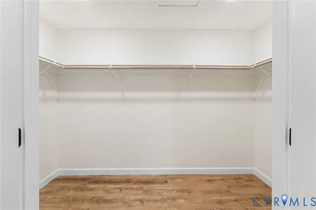 a view of an empty walk in closet