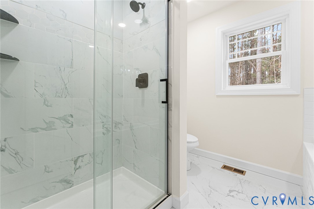 5132 Sunnyside Road Tappahannock, VA 22560 - Photo 18 of 28 a bathroom with a shower