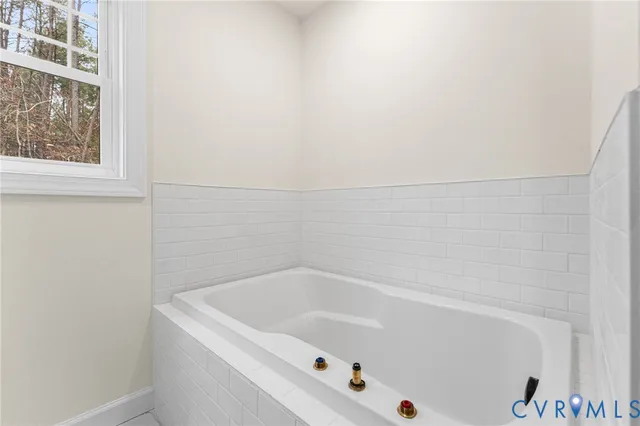 a bathroom with a bathtub