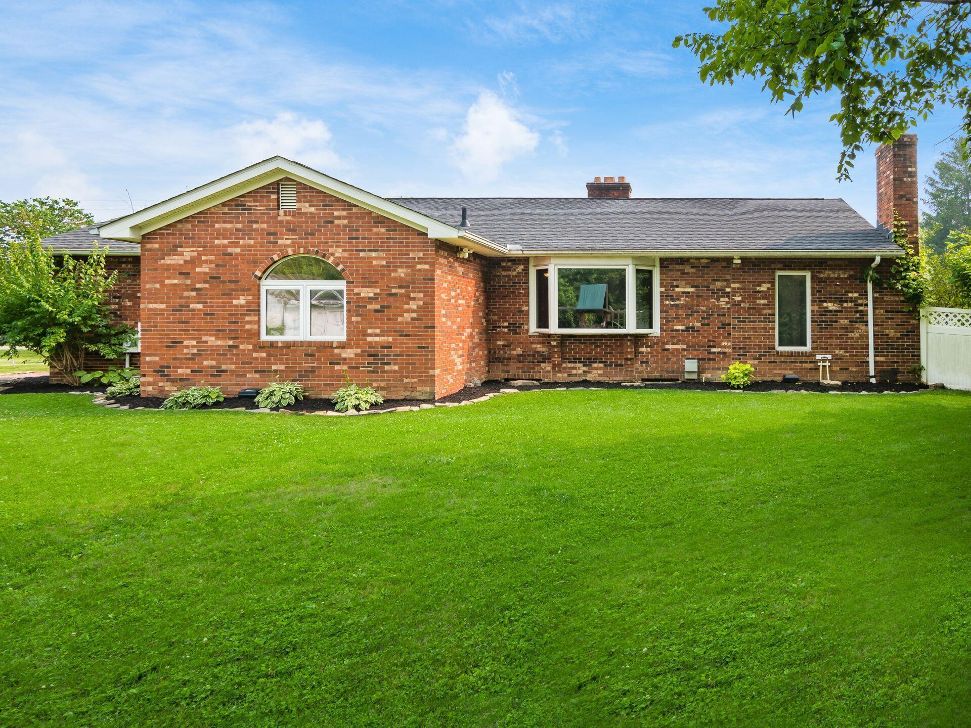 1586 Home Road Delaware, OH 43015 - Photo 9 of 52 Brick and Stucco Exterior