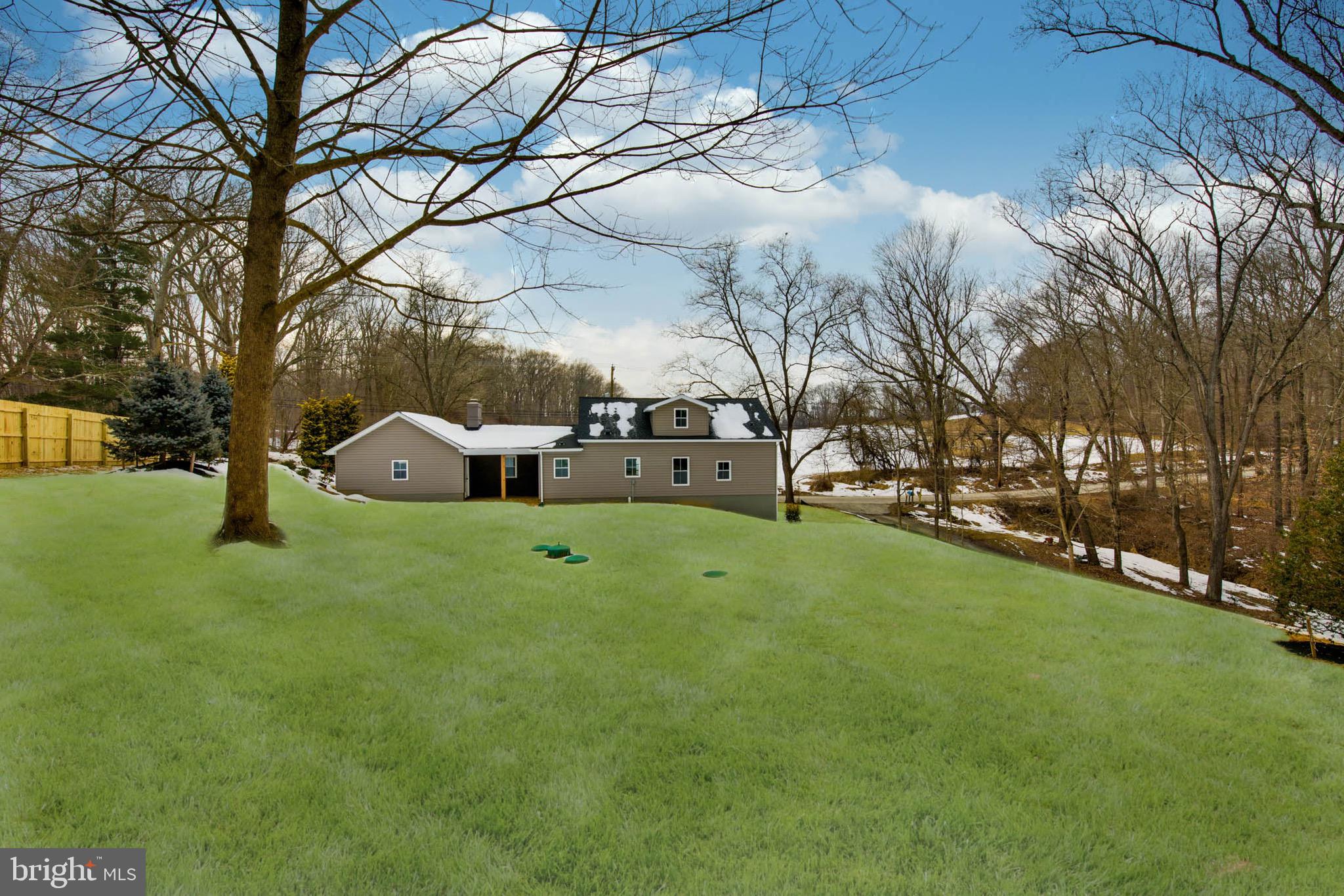 3747 Bay Road Street, MD 21154 - Photo 35 of 36 grass is rendering, back yard is seeded and straw