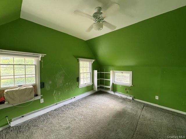 74 South Airmont Road Suffern, NY 10901 - Photo 21 of 42 Room featuring a sloped ceiling, recessed window, built-in shelving, and a ceiling fan