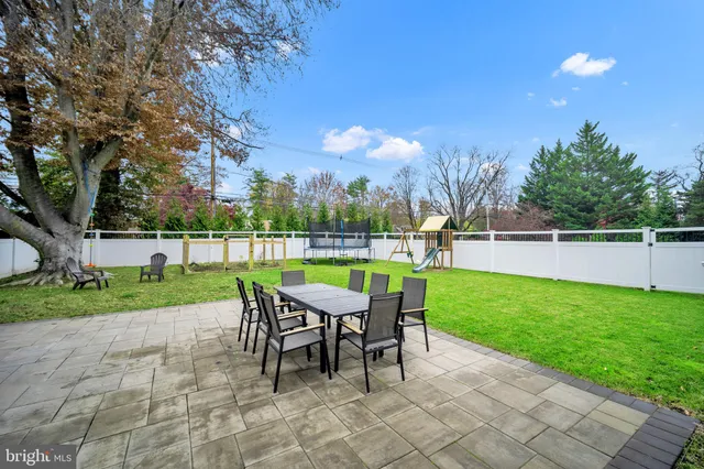 an aerial view of a house with a garden