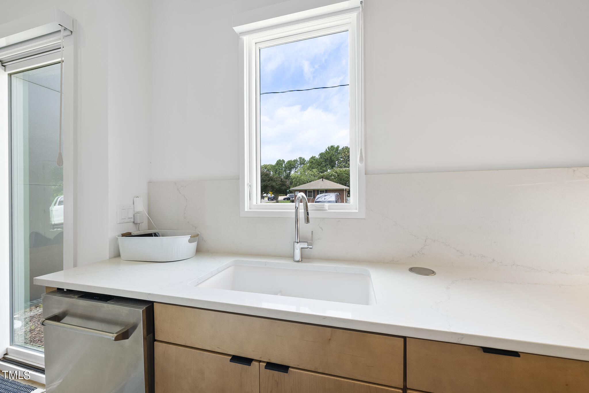 1012 Parker Street Raleigh, NC 27607 - Photo 13 of 39 a bathroom with a sink and a mirror