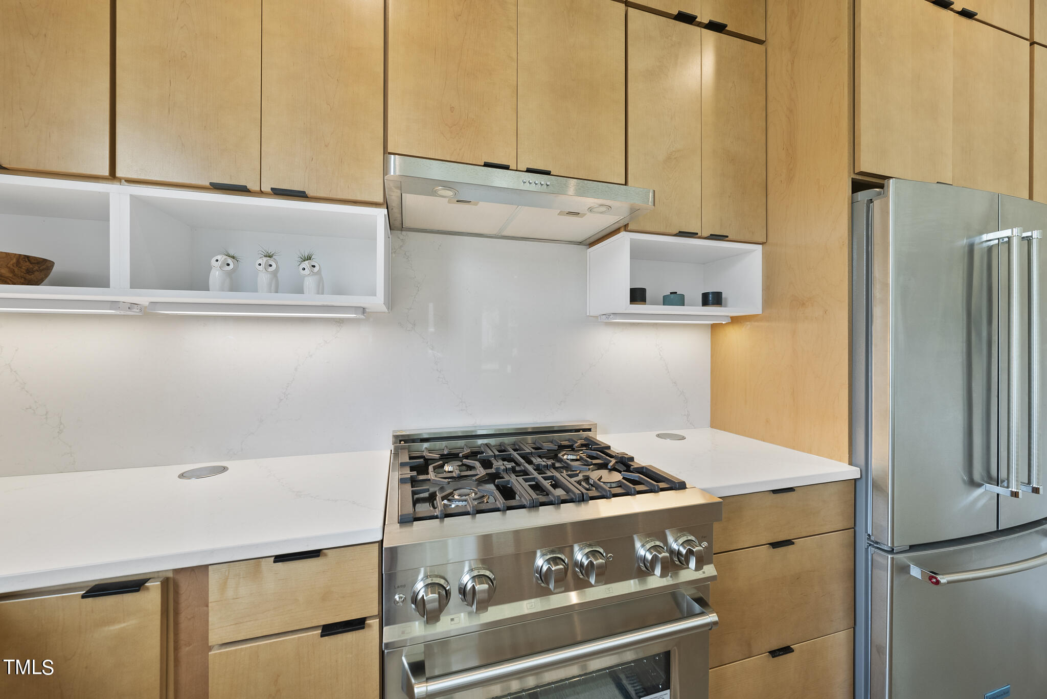 1012 Parker Street Raleigh, NC 27607 - Photo 21 of 39 a kitchen with a stove and a refrigerator