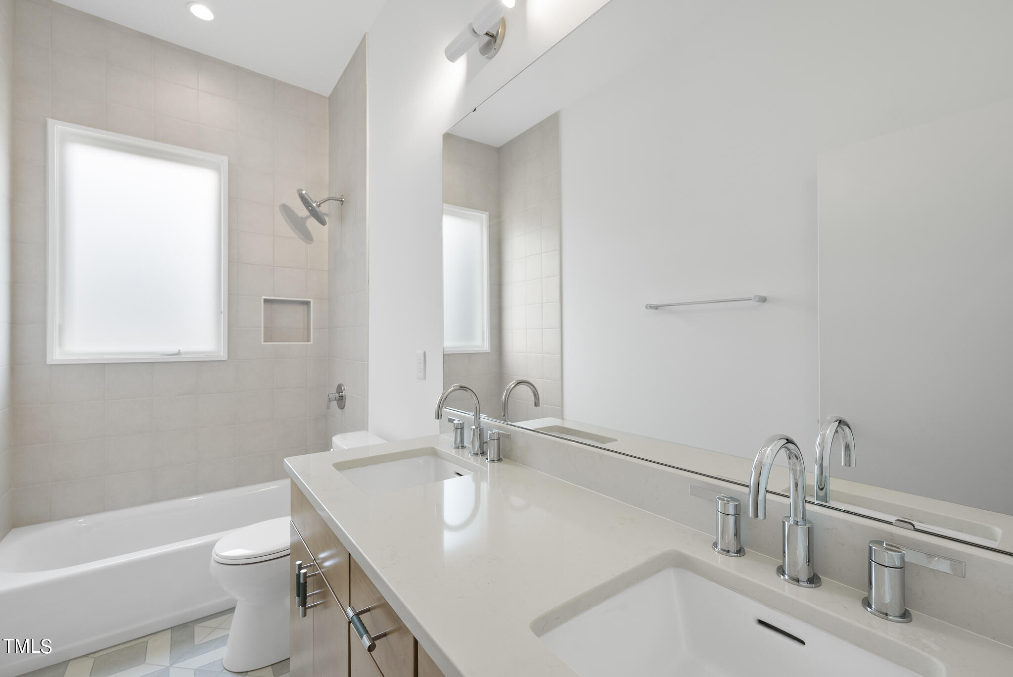 1012 Parker Street Raleigh, NC 27607 - Photo 22 of 39 a bathroom with a sink and a toilet