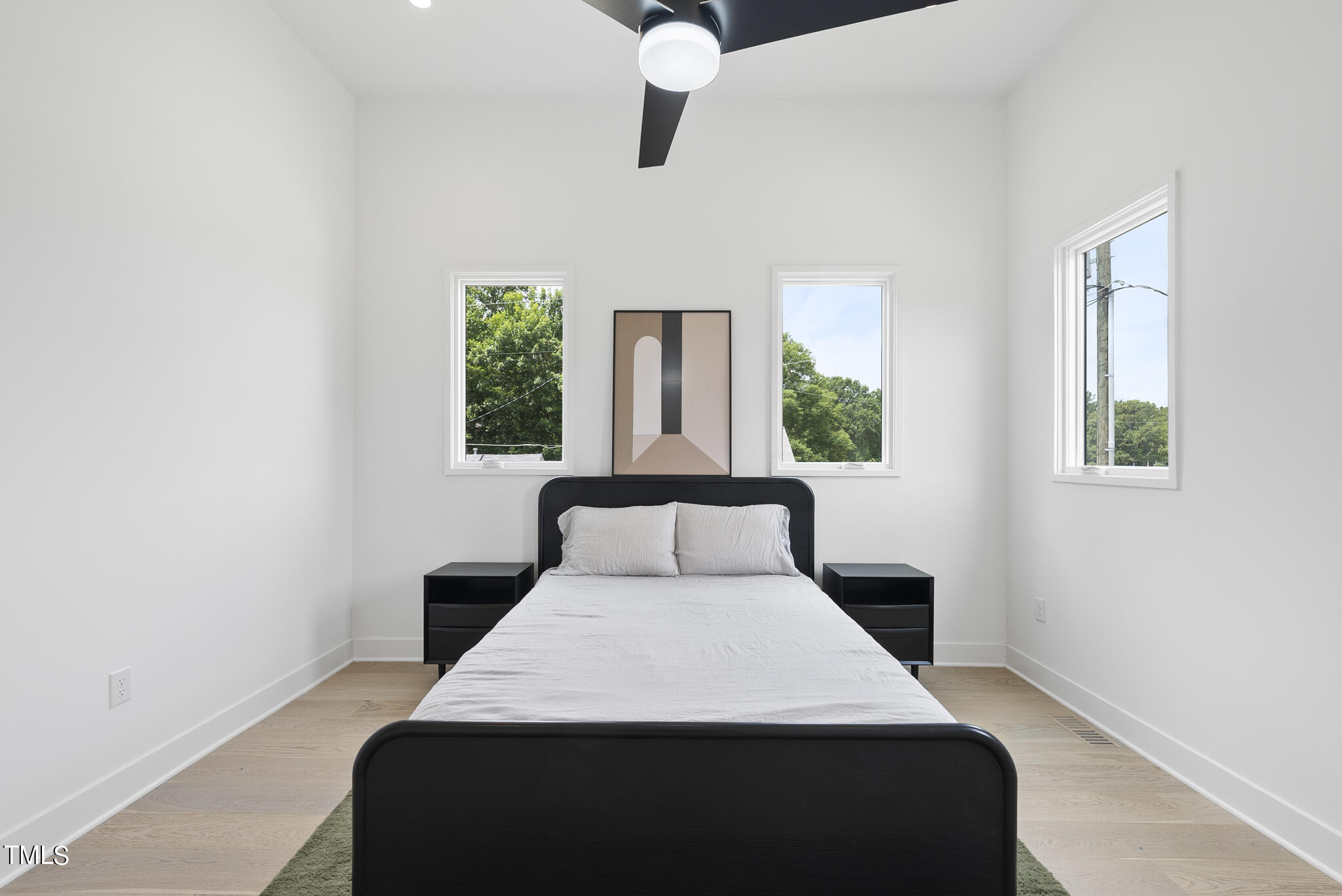 1012 Parker Street Raleigh, NC 27607 - Photo 25 of 39 a bedroom with a bed and window