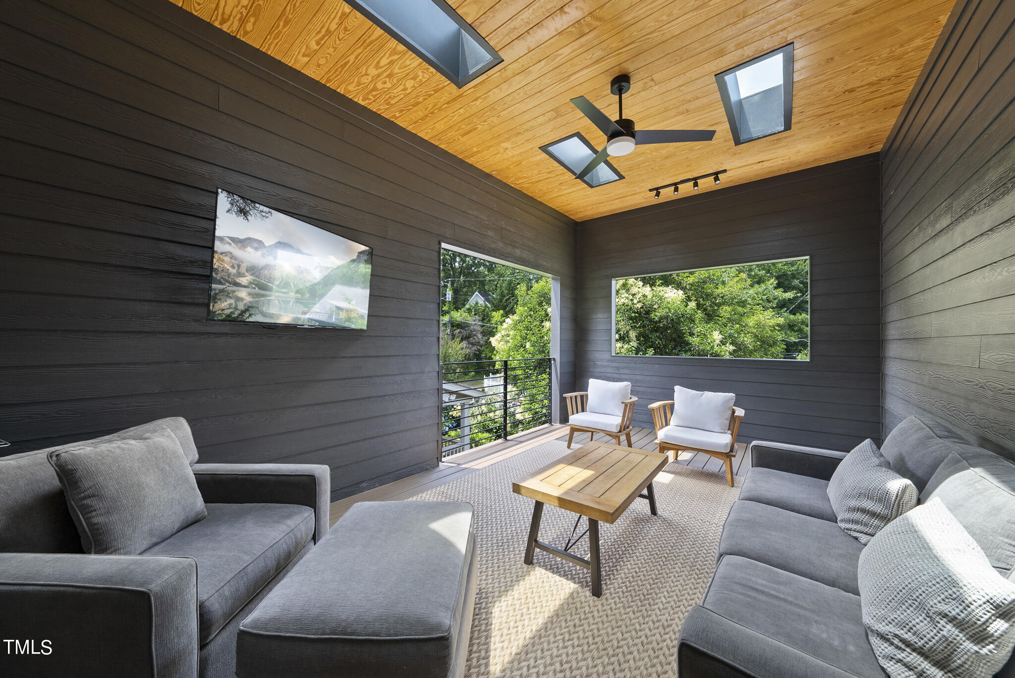 1012 Parker Street Raleigh, NC 27607 - Photo 27 of 39 a outdoor living space with furniture and a window