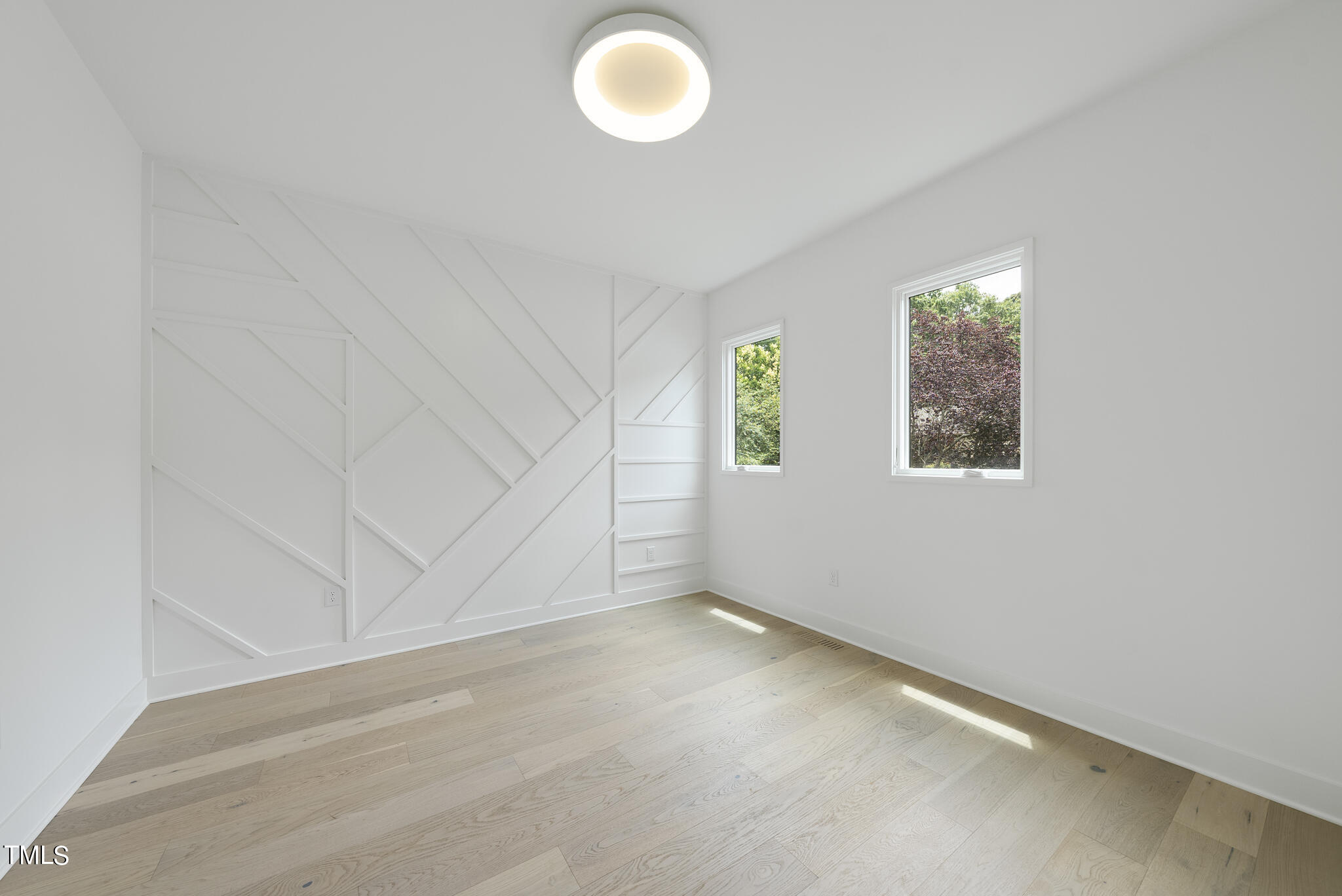 1012 Parker Street Raleigh, NC 27607 - Photo 30 of 39 an empty room with windows