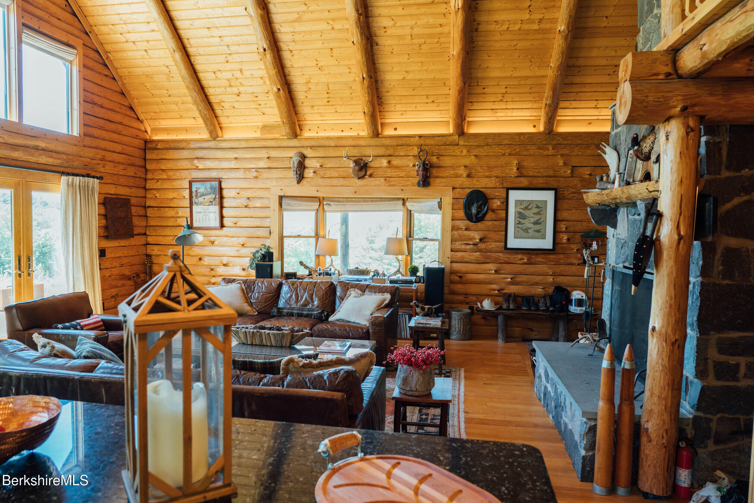15 Stephanie Lane Peru, MA 01235 - Photo 11 of 37 a view of a patio with couches chairs and kitchen view