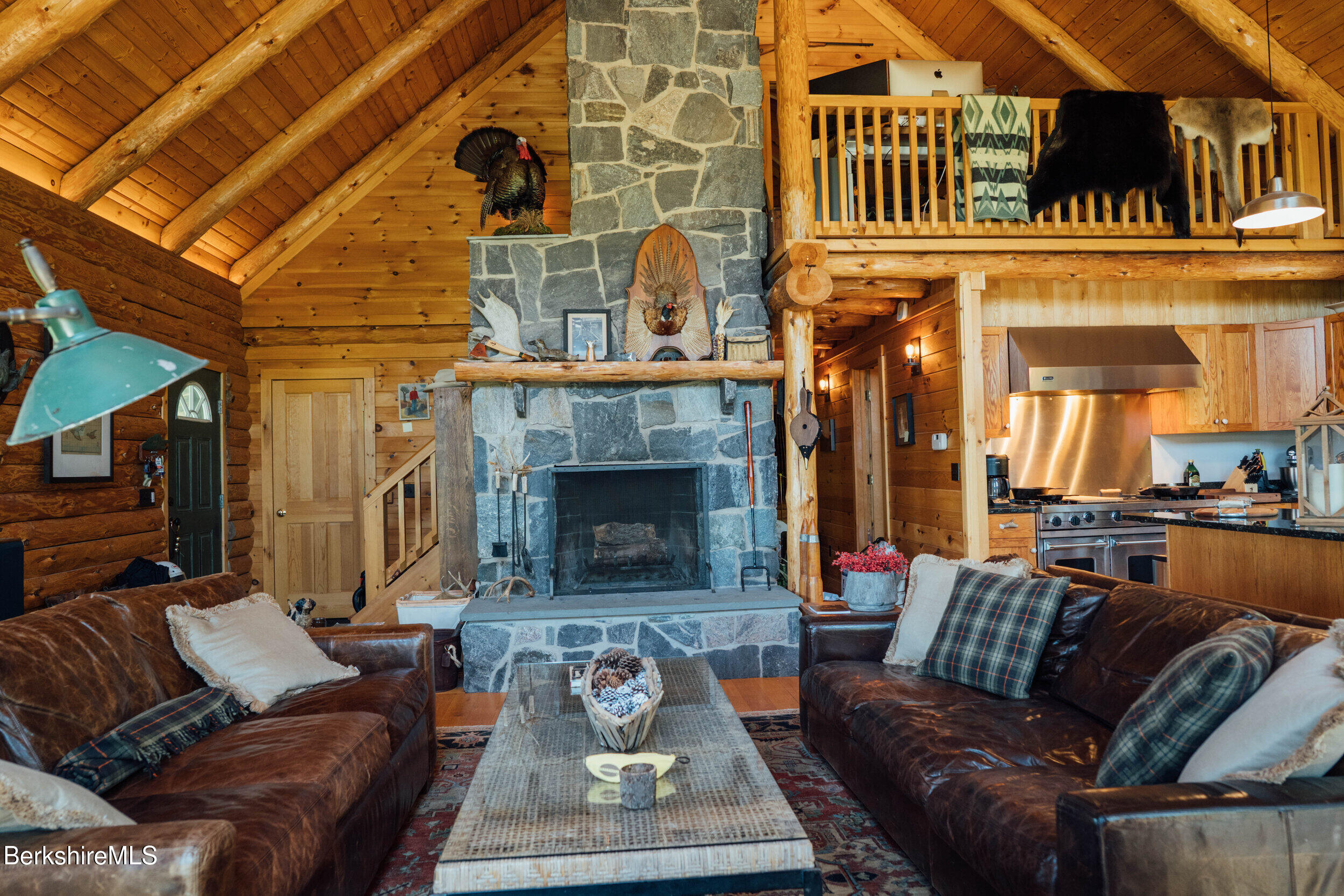 15 Stephanie Lane Peru, MA 01235 - Photo 12 of 37 a living room with furniture and a fireplace