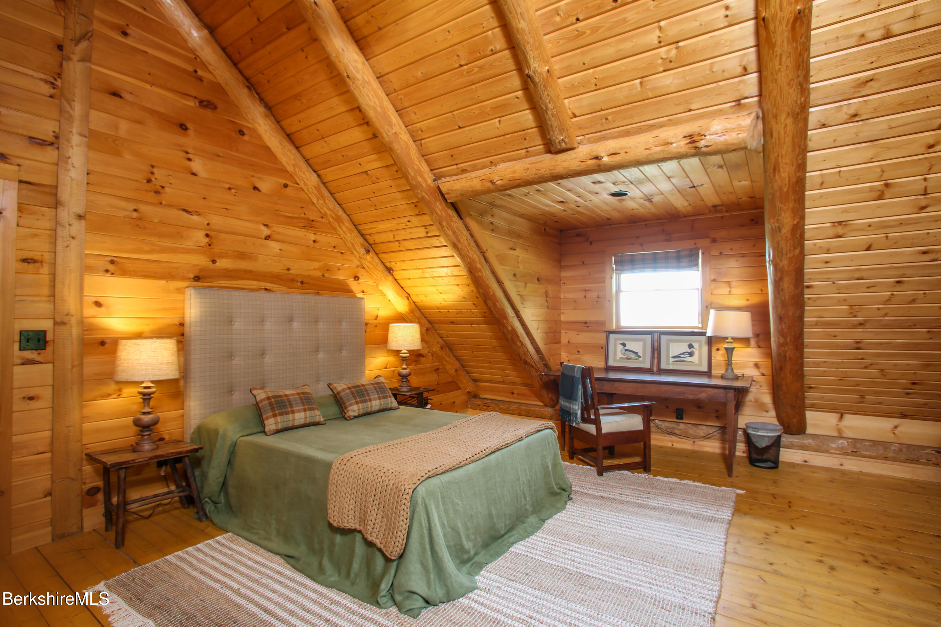 15 Stephanie Lane Peru, MA 01235 - Photo 20 of 37 a bedroom with a bed and wooden floor