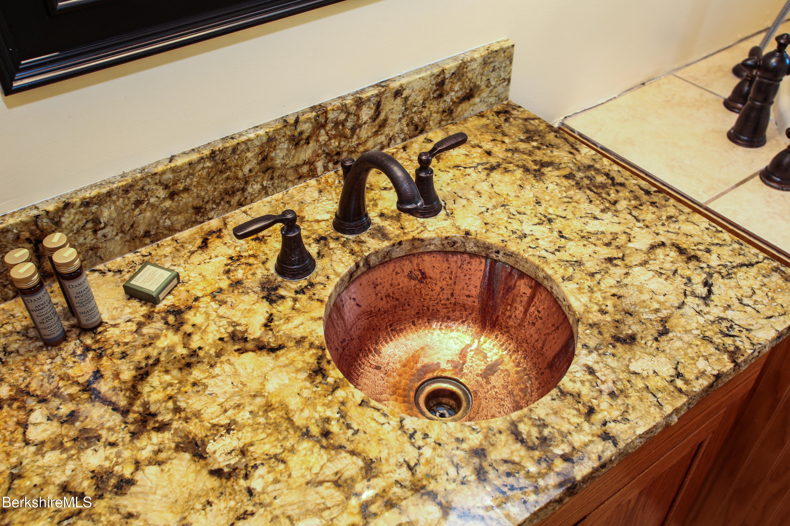 15 Stephanie Lane Peru, MA 01235 - Photo 22 of 37 a bathroom with a granite countertop sink and a mirror